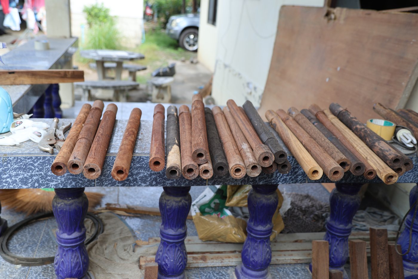 Flute blanks drying in a workshop, Northern Thailand, 2025.